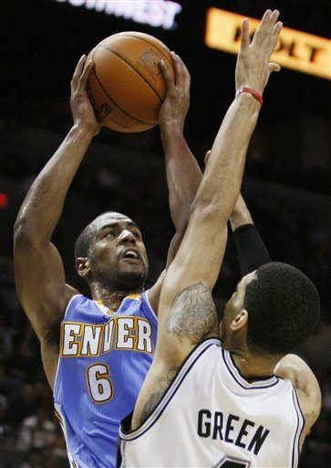 Denver Nuggets' Arron Afflalo, Left, Shoots