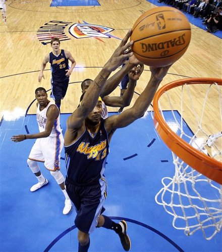 Denver Nuggets Forward Corey Brewer (13) Shoots