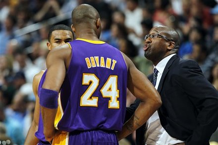 Los Angeles Lakers Head Coach Mike Brown, Right, Makes A Point To His Guards Ramon Sessions, Back Left, And Kobe Bryant