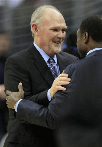 Denver Nuggets Head Coach George Karl, Left, Greets