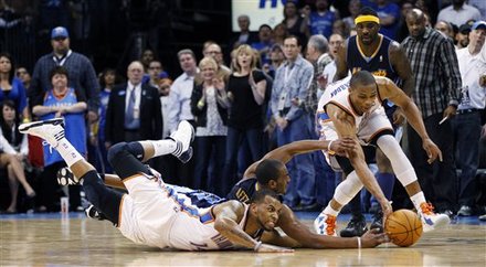 Oklahoma City Thunder Guard Russell Westbrook, Right, Grabs