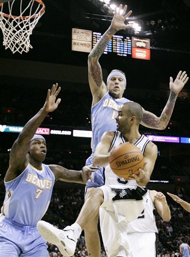 San Antonio Spurs' Tony Parker, Bottom Right, Of France, Is Defended By Denver Nuggets' Al Harrington, Left, And Chris