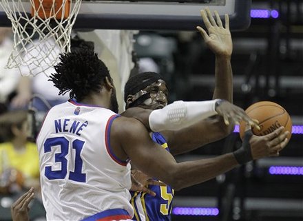 Denver Nuggets' Nene. Left, Is