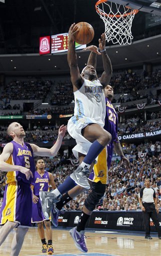 Denver Nuggets Guard Ty Lawson, Front, Slides