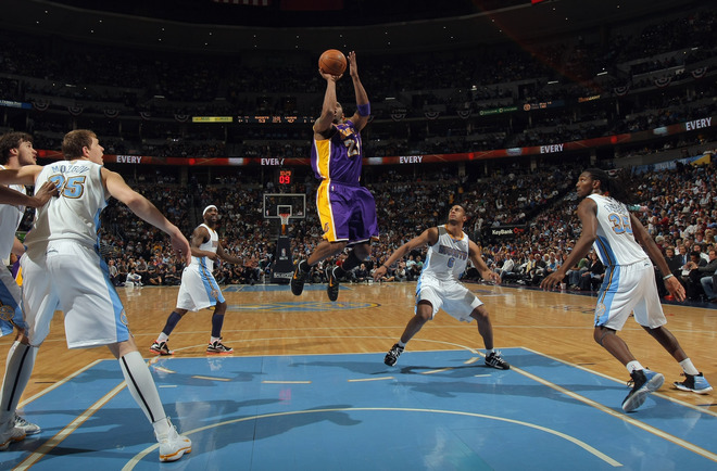 Kobe Bryant #24 Of The Los Angeles Lakers Takes