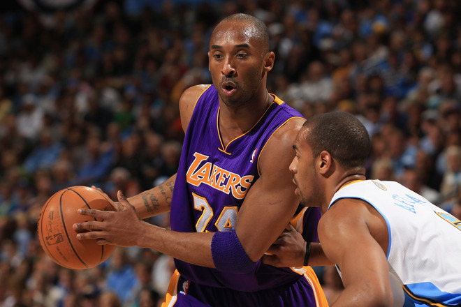 Kobe Bryant #24 Of The Los Angeles Lakers Controls