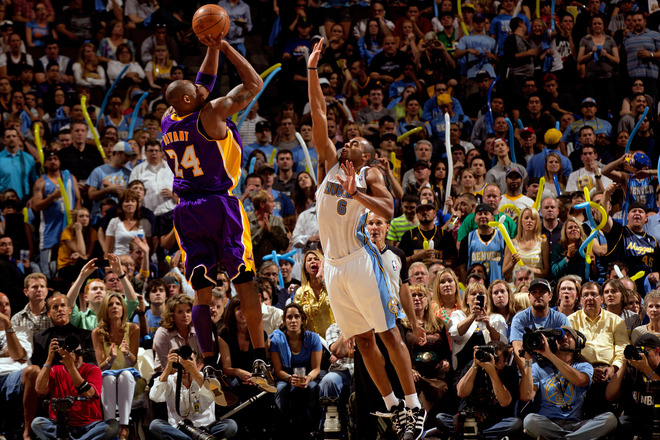 Kobe Bryant #24 Of The Los Angeles Lakers Scores