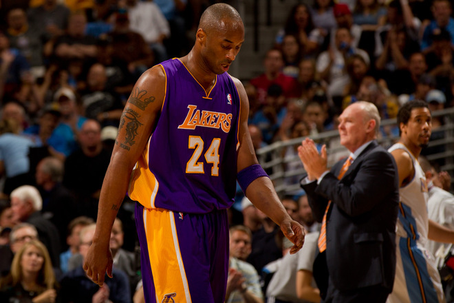 Kobe Bryant #24 Of The Los Angeles Lakers Walks