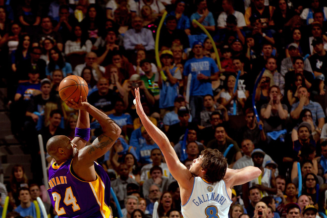 Kobe Bryant #24 Of The Los Angeles Lakers Scores