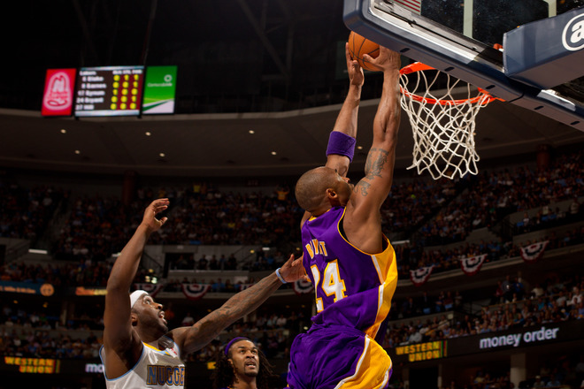 Kobe Bryant #24 Of The Los Angeles Lakers Dunks