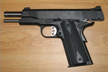 슬라이드가 후퇴 고정된 상태의 M1911장전된 탄환을 모두 발사하면 자동으로 슬라이드가 후퇴 고정된다. 라이선스 생산된 민간용 커스텀 모델이다.