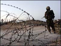 Israeli soldier on border looks at UN position - photo 9/8/06