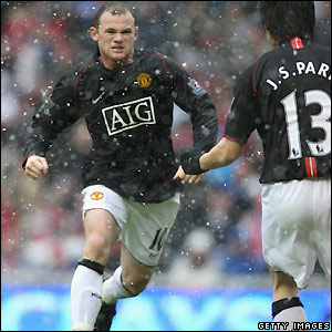 Rooney celebrates making it 2-2