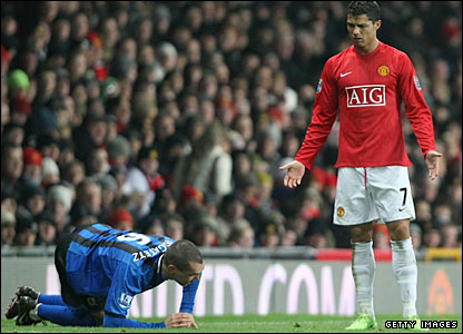 Ronaldo protests his innocence after bringing down Emanuel Pogatetz