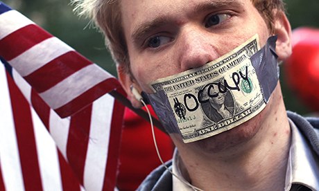 An Occupy Wall Street demonstrator … the group has put its money where its mouth is.