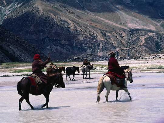  Crossing the Kali Gandaki River on horseback, Mustang Conservation Area