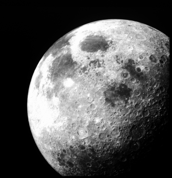 After Apollo 12 left lunar orbit this image of the moon was taken from the command module on Nov. 24, 1969.