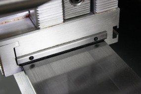 Bed Wiper on Tailstock .