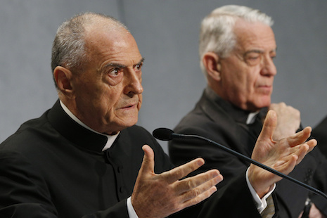<p>Msgr. Pio Vito Pinto, dean of the Roman Rota, speaks at a Sept. 8 Vatican press conference for the release of Pope Francis' documents concerning changes to the annulment process. Also pictured is Jesuit Father Federico Lombardi, the Vatican spokesman.</p>