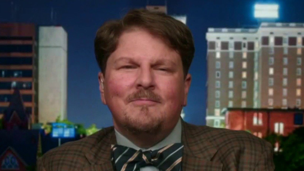 Pollster predicts Trump will be reelected in close race