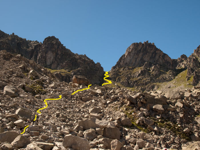 The trail coming down from the pass through a boulder field The trail coming down from the pass through a boulder field