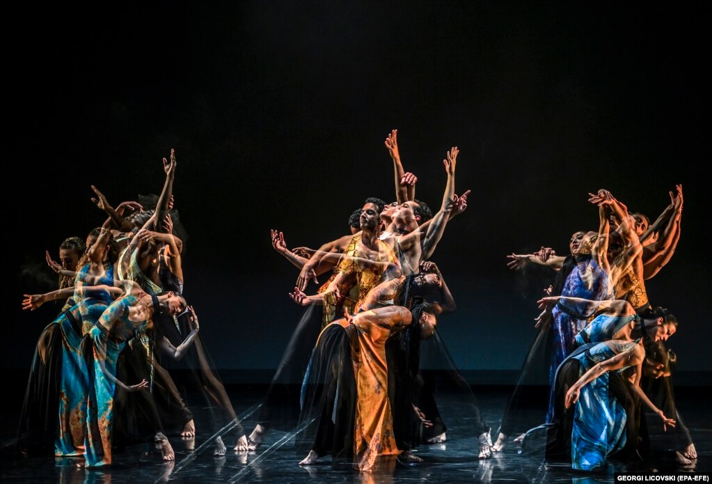 Members of the Martha Graham Dance Company perform in a multiple exposure photo during the last evening of the Skopje Dance Fest 2022 in Skopje, North Macedonia.