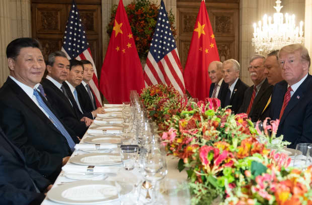 China's President Xi Jinping, U.S. President Trump and members of their delegations at a working dinner after the G-20 summit in Buenos Aires on Saturday.