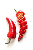 Red Chili Peppers Sliced on White Background