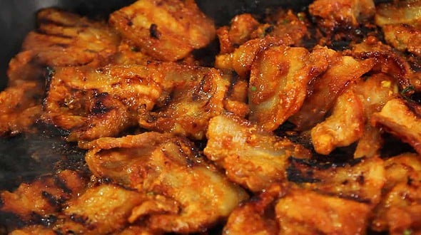 Dwaejibulgogi grilling