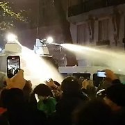 Paris riots erupt causing police to fire water cannon at furious Macron protesters