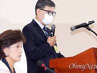 마스크증인' 진화위 국장,..