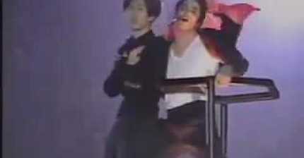 Korean fan jumps onto crane with Michael Jackson during Earth Song