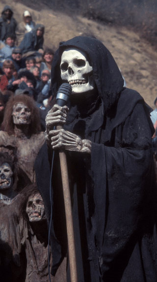 chromed.out_unsettling_grotesque_horrific_grim_reaper_holding_d130aa94-257d-4c72-978f-c67d86cfa084_0.gif
