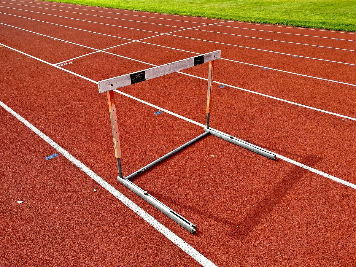 1200px-Hurdle_on_athletic_track.jpg