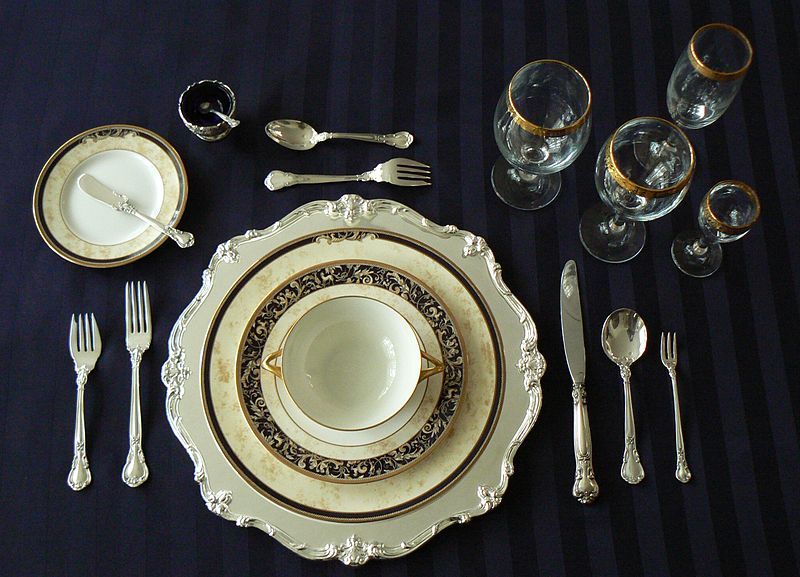 Service à la russe formal place setting showing glassware for a range of beverages.jpg