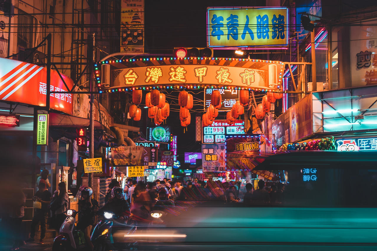 Busy junction at the street of Taichung Fengcia night market.jpg