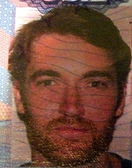 440px-Ross_Ulbricht_passport_photo.jpg