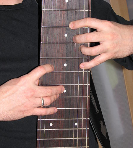 450px-Two_Hand_Tapping.jpg