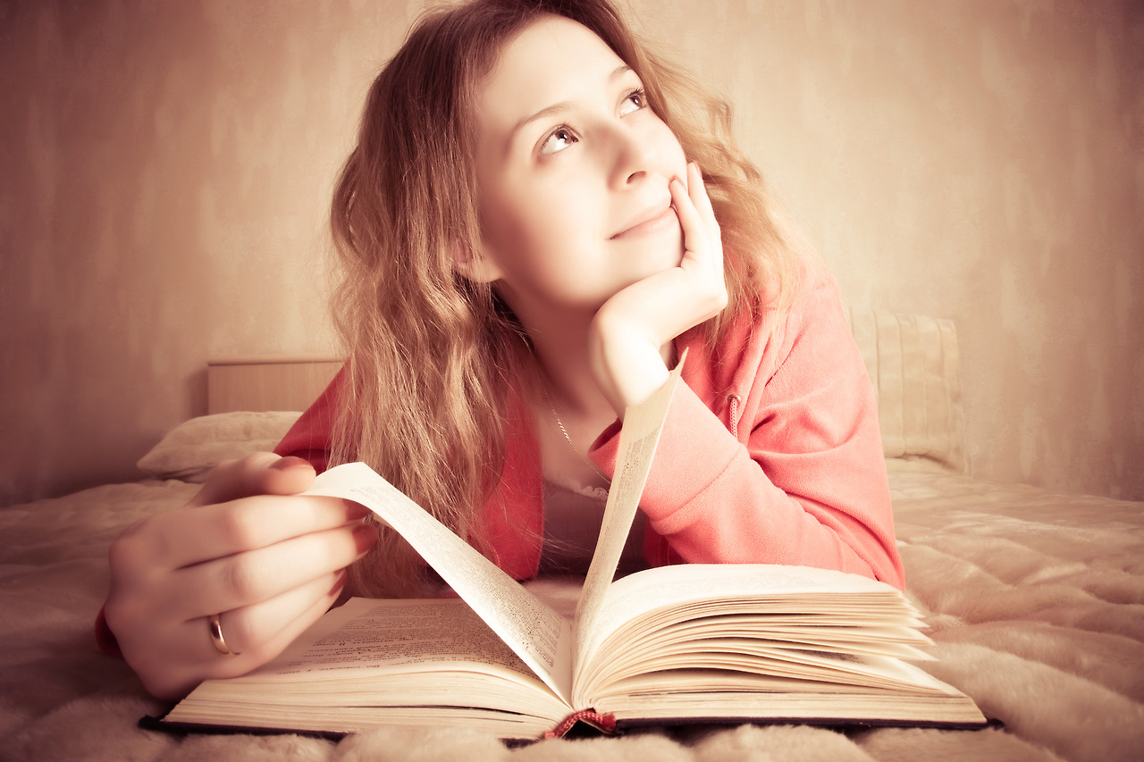 bigstock-girl-dreams-reading-the-book-15369656-2.jpg