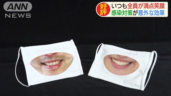 japanese-shop-lauches-smile-masks-staff-look-friendly-14-5f460268caf0a__700.jpg