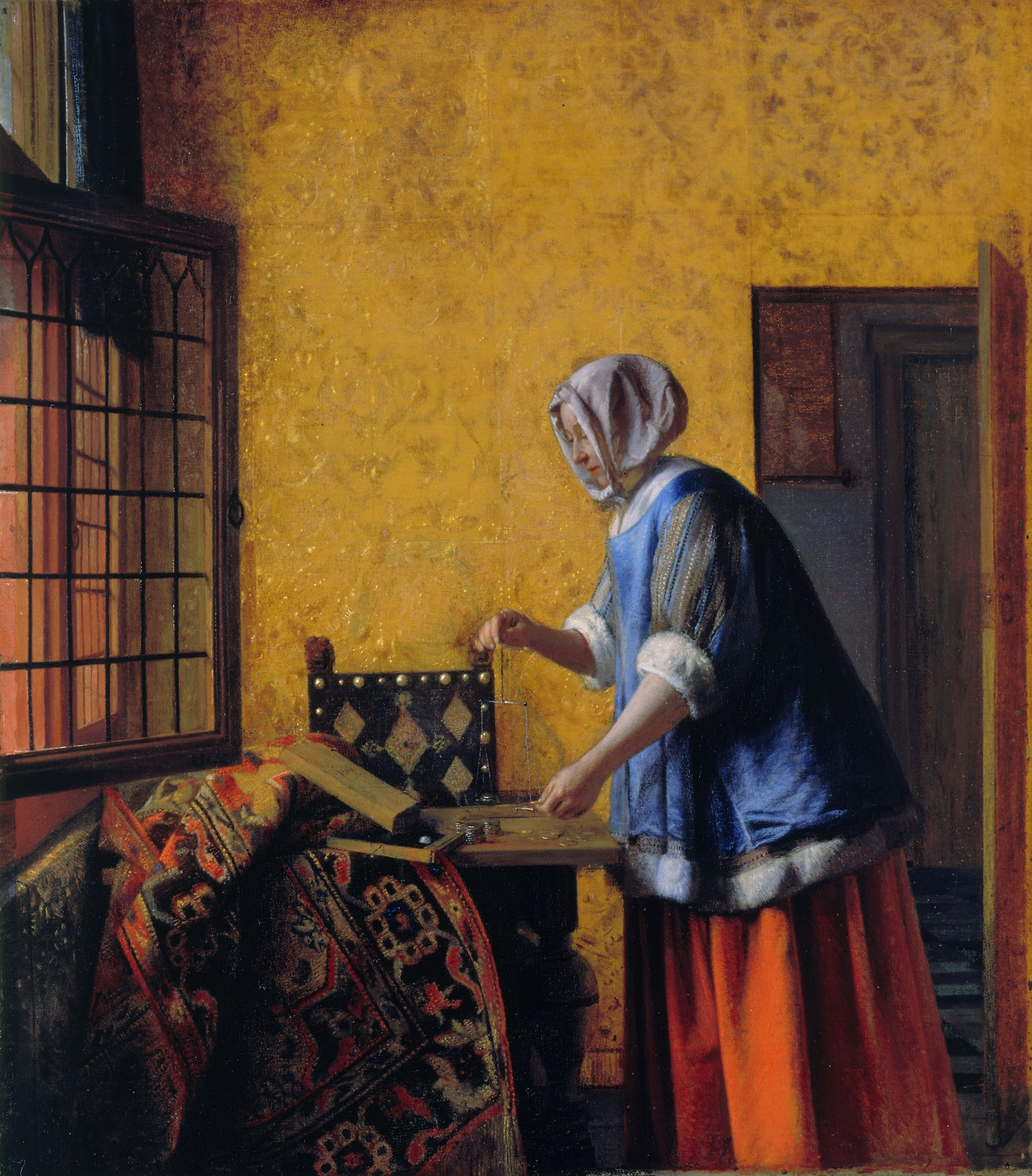 A_woman_with_a_pair_of_scales,_by_Pieter_de_Hooch-1664.jpg