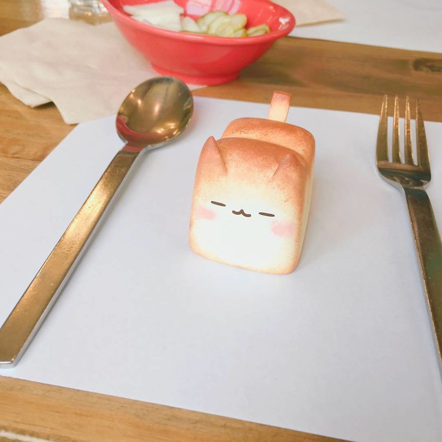 Warmly-baked-The-Breadcat-5776245f4b0ca__880.jpg