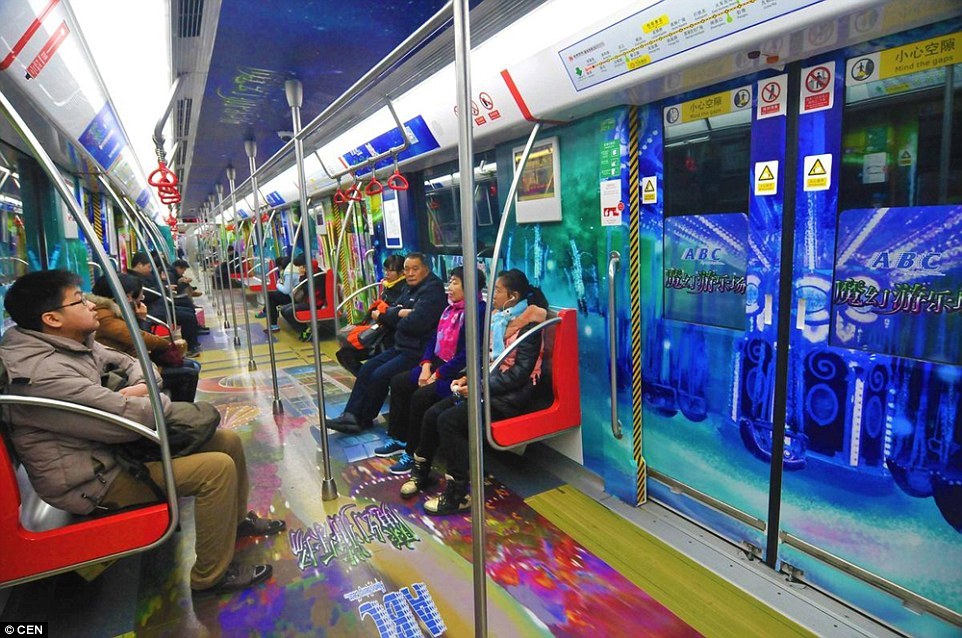2699EA1600000578-2993569-Psychedelic_Each_of_the_carriages_contained_different_images_ran-a-59_1426266065609.jpg
