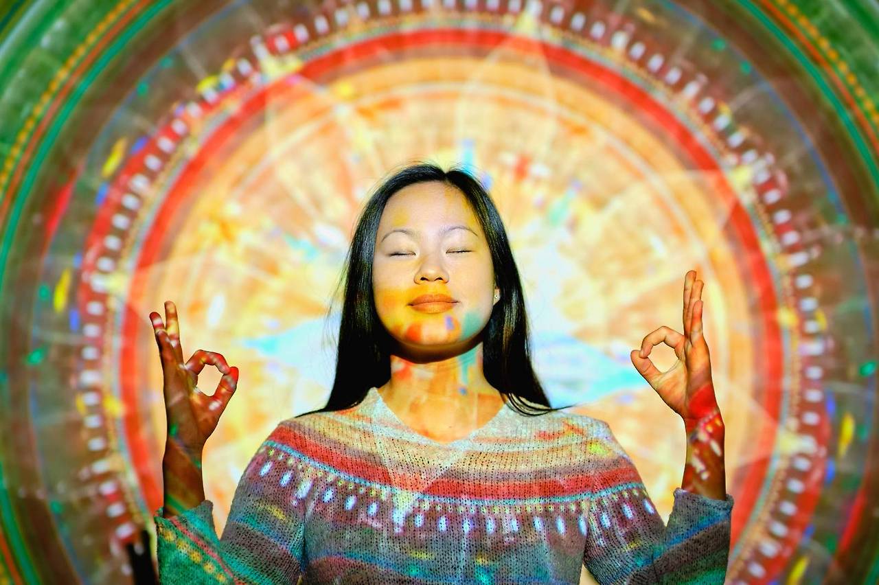 asian-woman-meditating-near-mandala-2023-11-27-04-50-05-utc (1).jpg