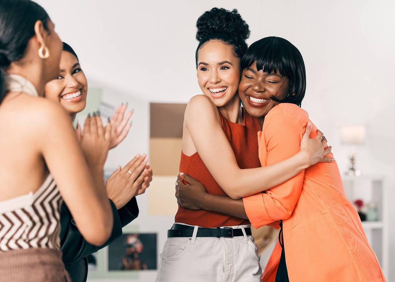 shot-of-a-group-of-young-businesswomen-clapping-fo-2023-11-27-05-19-30-utc (1).jpg