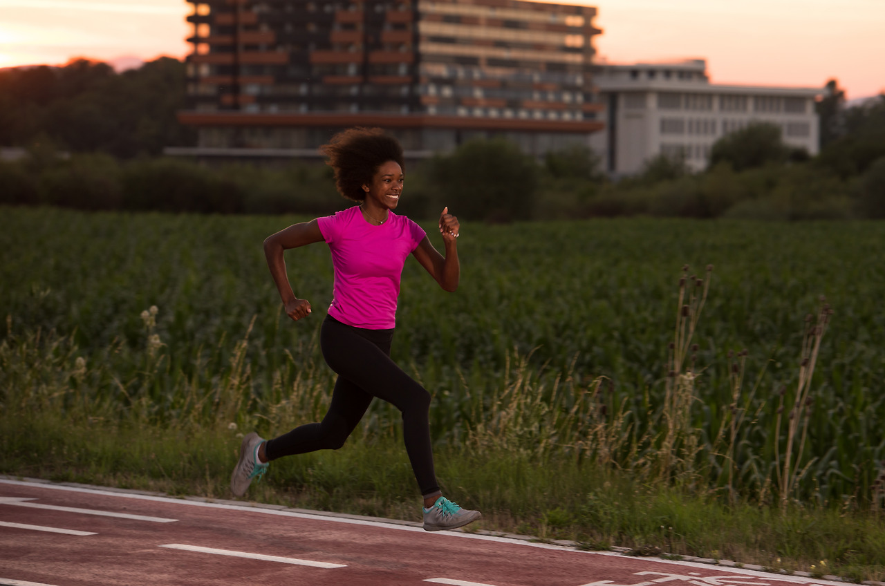 a-young-african-american-woman-jogging-outdoors-2023-11-27-05-21-52-utc.jpg