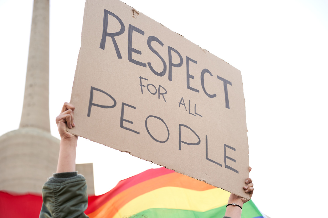a-person-holding-a-banner-saying-respect-for-all-p-2025-01-09-00-28-21-utc.jpg