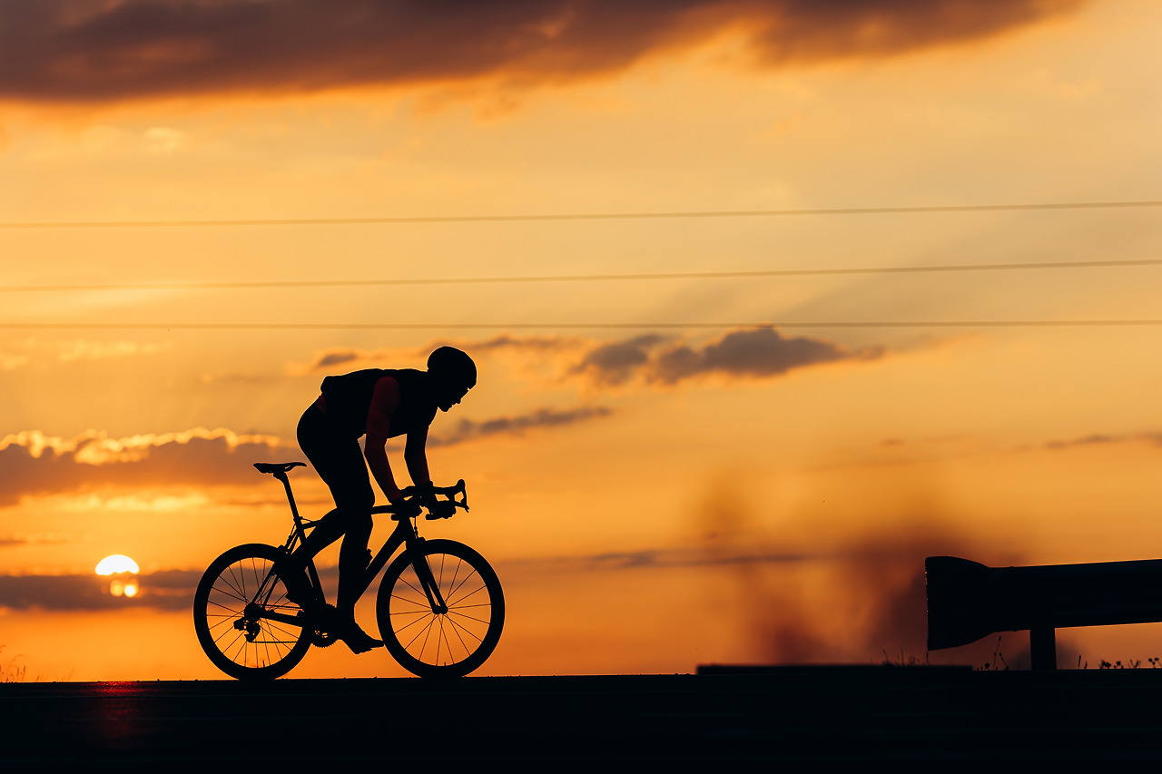 silhouette-of-strong-athlete-riding-bike-outdoors-2023-11-27-05-28-25-utc.jpg
