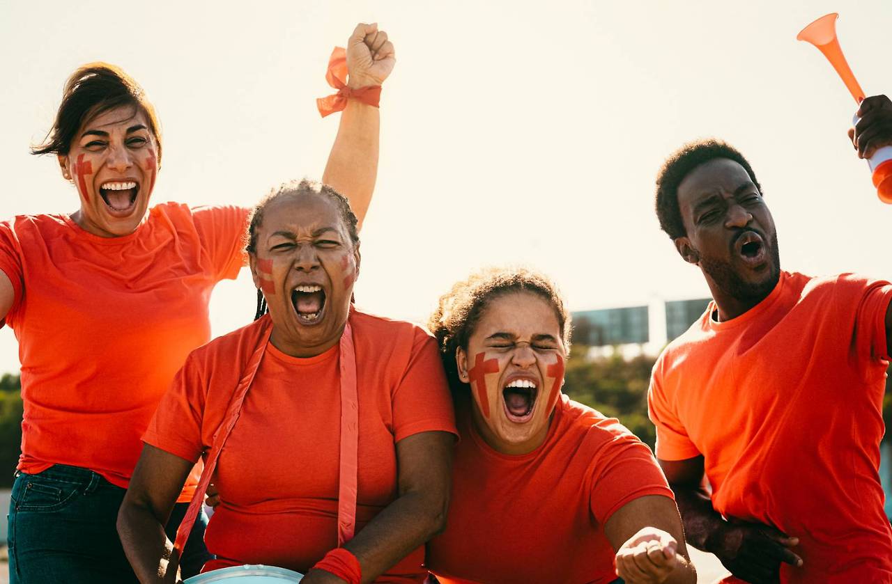 red-football-fans-having-fun-cheering-their-favori-2024-11-27-12-13-05-utc (1).jpg