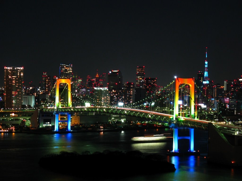 Rainbow_colored_Rainbow_Bridge_at_night.jpg